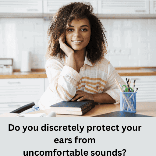 Adult sitting at a desk with book looking out discretely covering one ear with head propped on hand. Words, Do you discretely protect your ears from uncomfortable sounds?